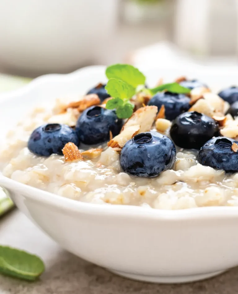 bowl of blueberries and almonds on grains