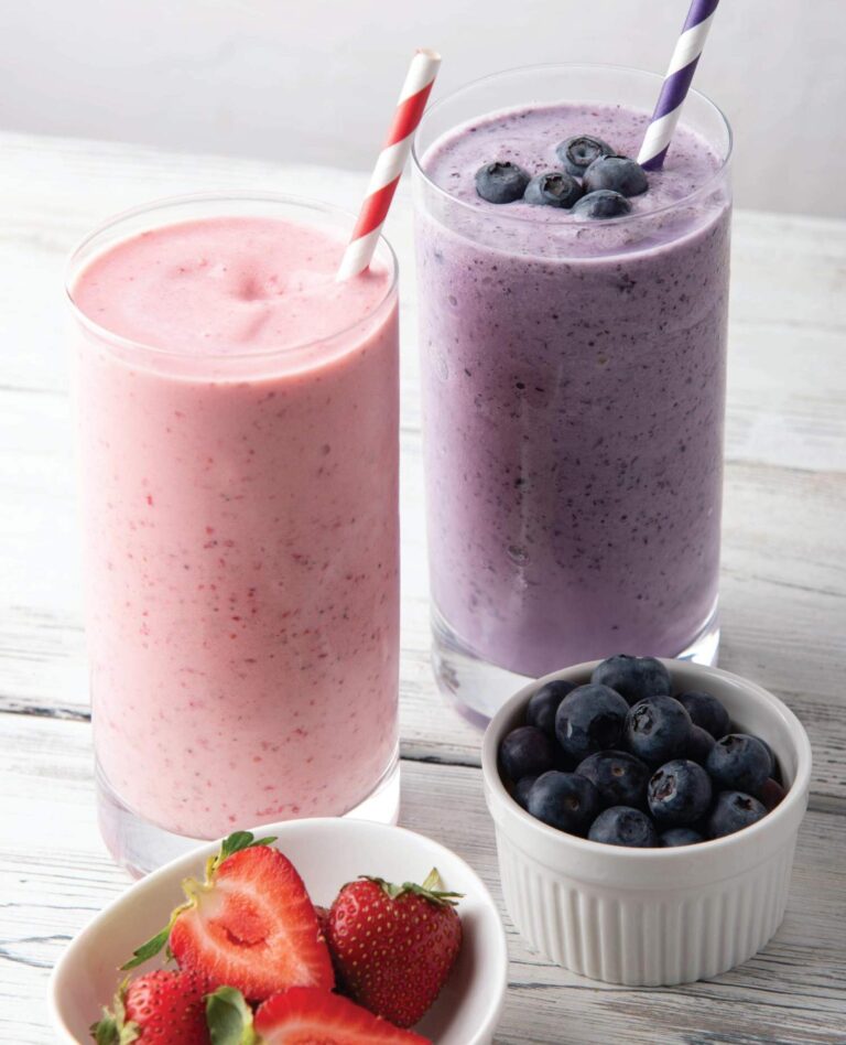 glasses with blueberry and strawberry daquiris