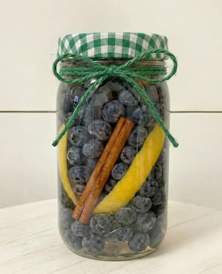 blueberries in jar with pickling vinegar